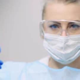 Doctor Measuring Patient Temperature at Health Care Clinic (Stock Footage) Free Download