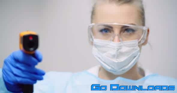 Doctor Measuring Patient Temperature at Health Care Clinic (Stock Footage) Free Download